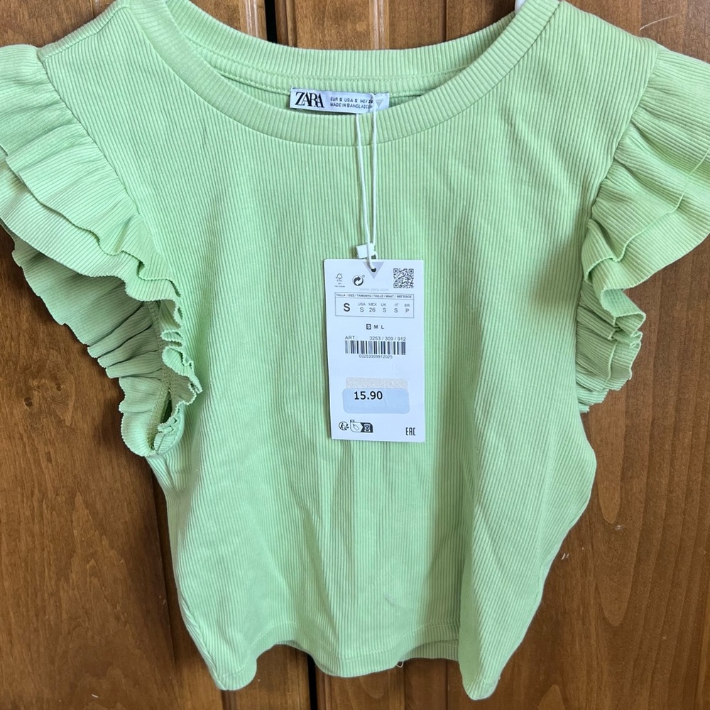 Green ruffle sleeve top